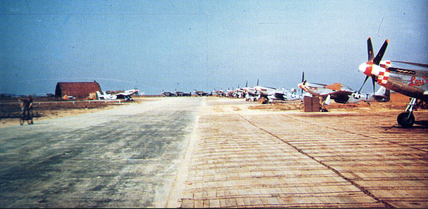 The 504th FS flightline on the eastern side of the airfield.  The photograph is taken looking south from approximately the ‘25’ marking on the present runway, with the road just out of view to the left.